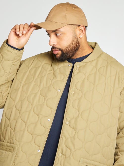 Doorgestikt donsjack met afneembare mouwen - Kiabi