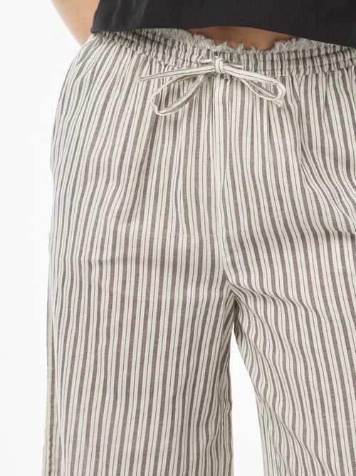 Dunne gestreepte broek met franjes - Kiabi