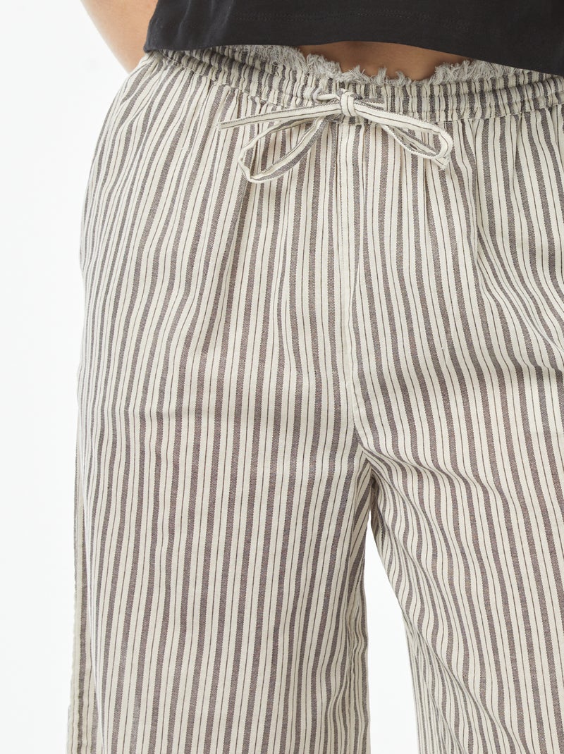 Dunne gestreepte broek met franjes Grijs - Kiabi