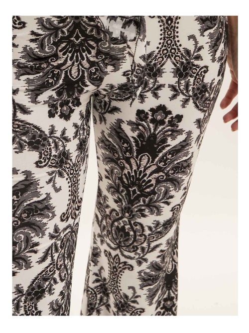Edarzine flared broek met patroon - Kiabi Edarzine flared broek met patroon - Kiabi