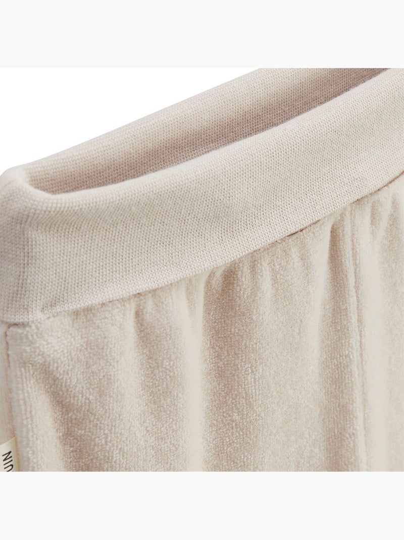 Eden fluwelen babyset: vestje en broekje met voetjes Beige - Kiabi
