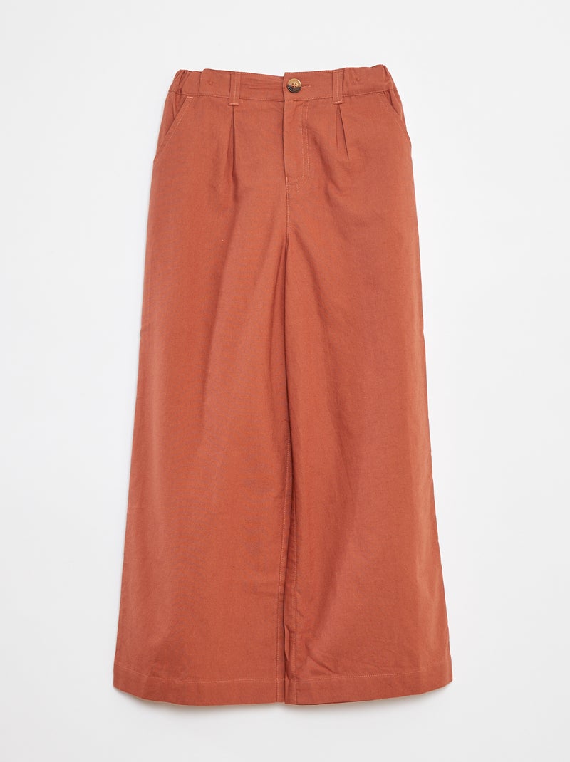 Een kleurrijke broek met wijde pijpen Bruin - Kiabi
