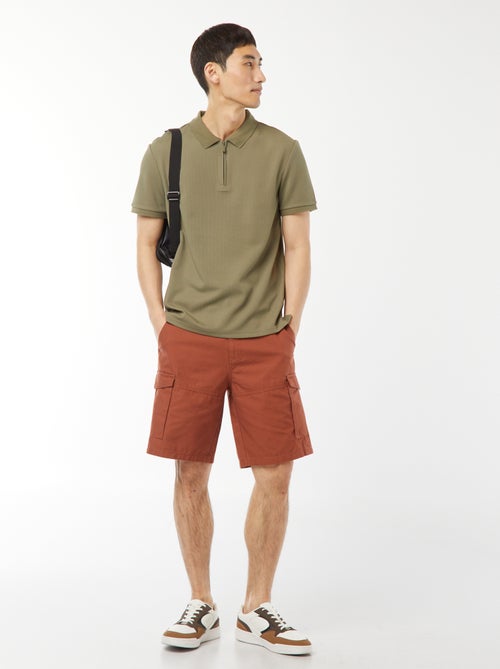 Een polo met wafeltextuur en ritsje aan de hals! - Kiabi