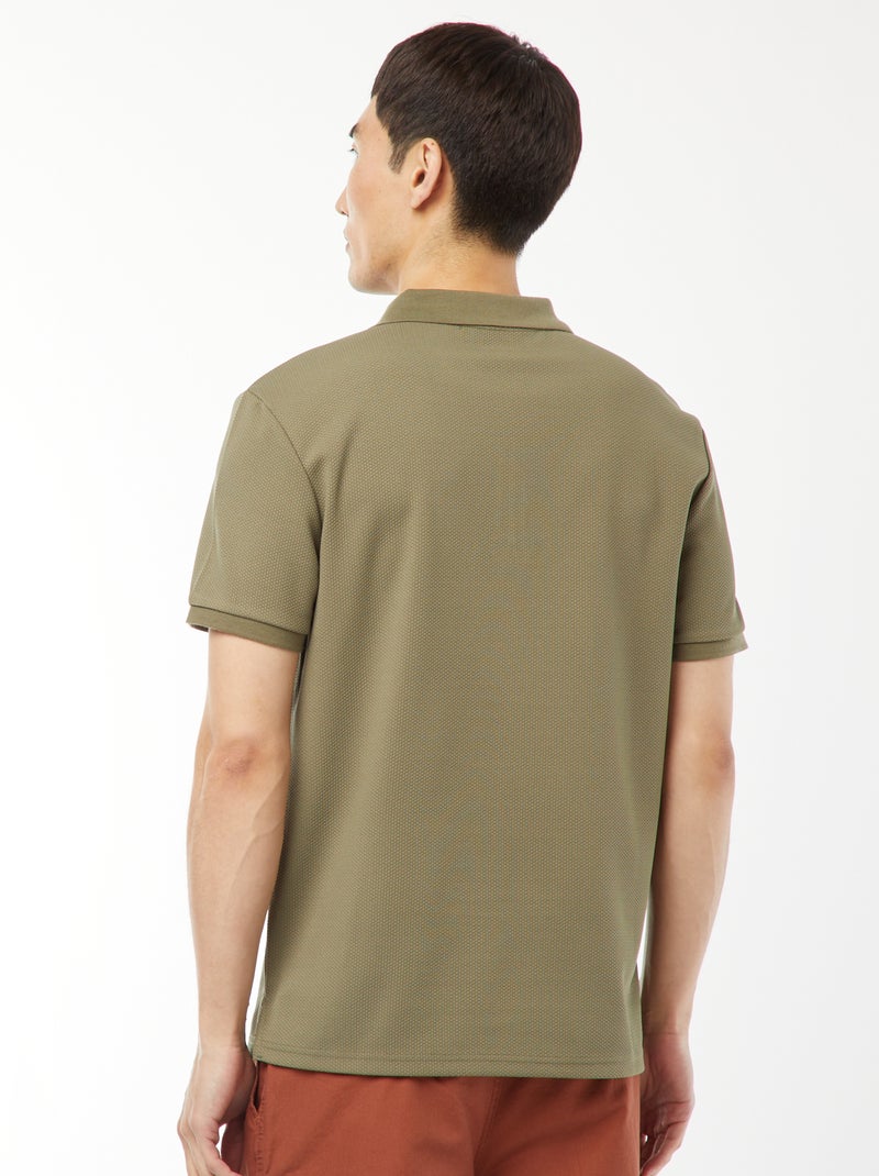 Een polo met wafeltextuur en ritsje aan de hals! groen - Kiabi