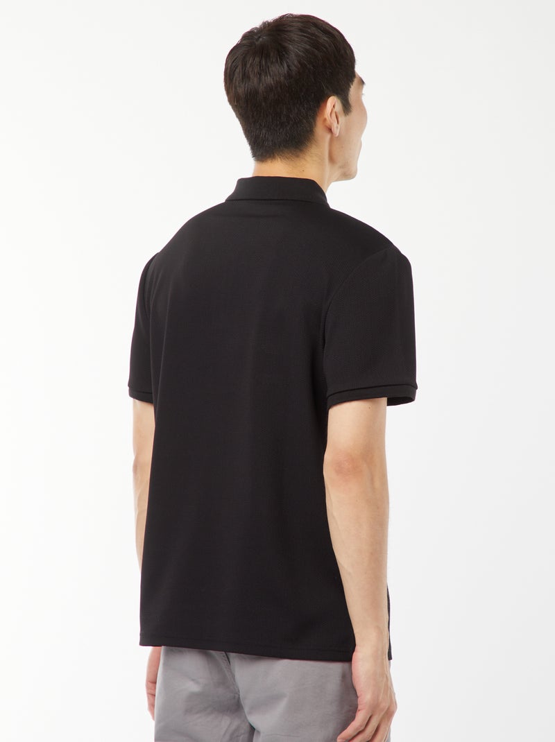 Een polo met wafeltextuur en ritsje aan de hals! zwart - Kiabi