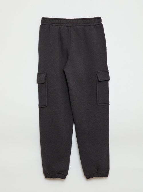 Effen fleece joggingbroek met zakken - Kiabi Effen fleece joggingbroek met zakken - Kiabi