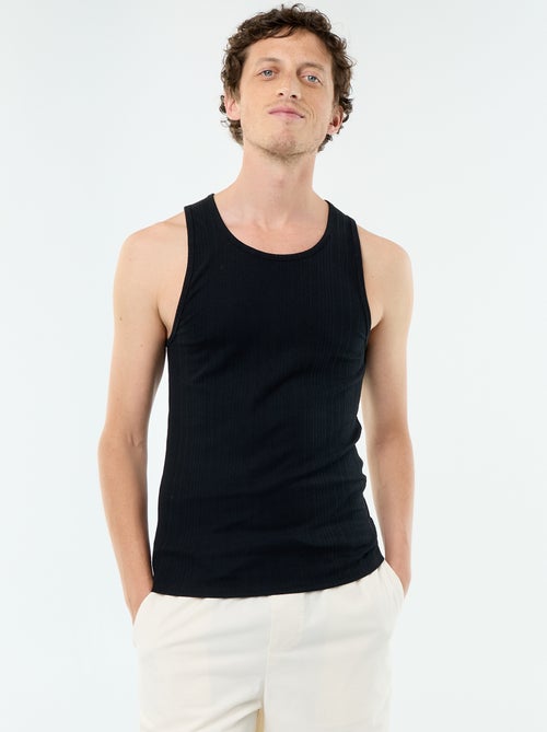 Effen geribd mouwloos shirt - Kiabi Effen geribd mouwloos shirt - Kiabi