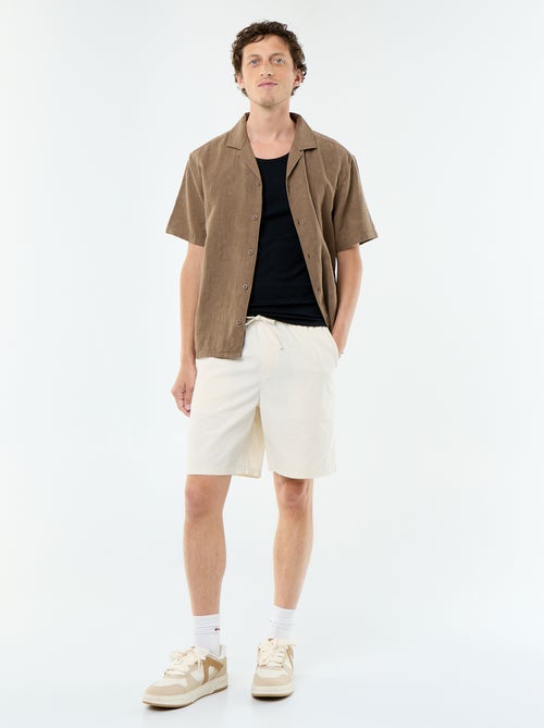 Effen geribd mouwloos shirt - Kiabi Effen geribd mouwloos shirt - Kiabi