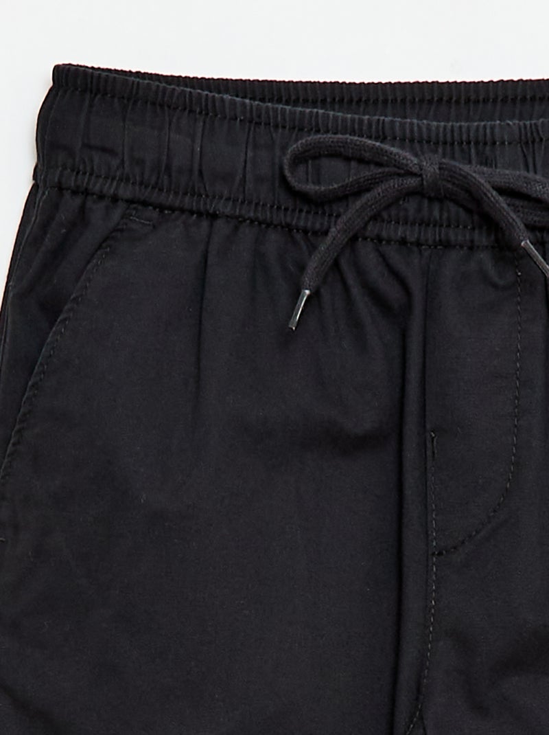 Effen jogger met boorden Zwart - Kiabi