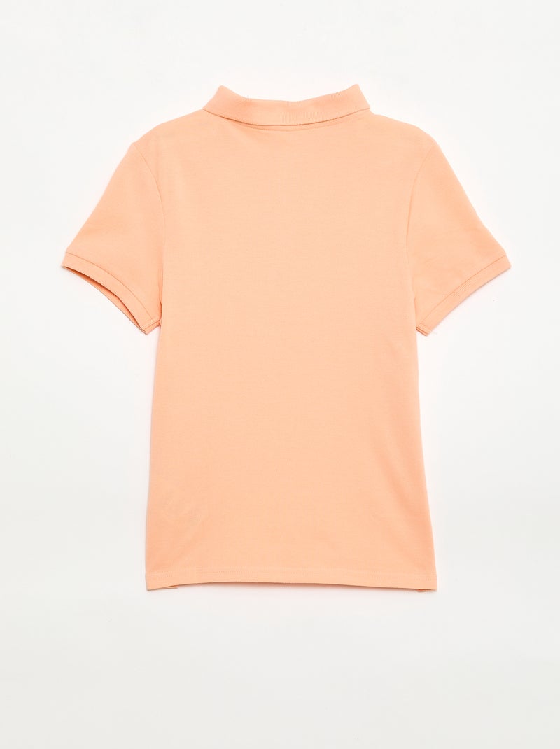 Effen polo van piquétricot Perzik - Kiabi