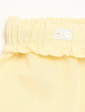 Effen short met fantasie strik