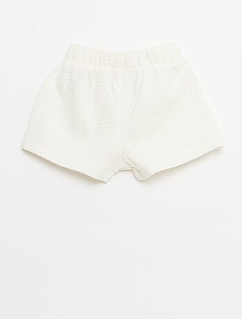 Effen short van jacquardbreisel met fantasieknoop