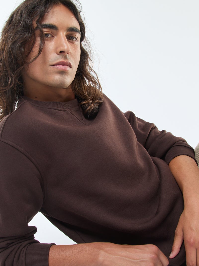 Effen sweater van geruwde fleece met ronde hals bruin - Kiabi