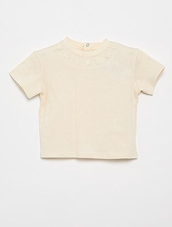 Effen T-shirt met fantasiebloemen aan de kraag