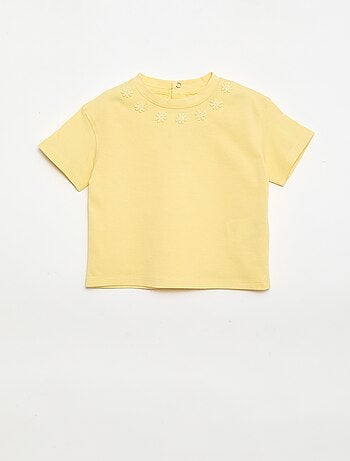 Effen T-shirt met fantasiebloemen aan de kraag