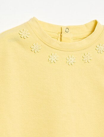 Effen T-shirt met fantasiebloemen aan de kraag