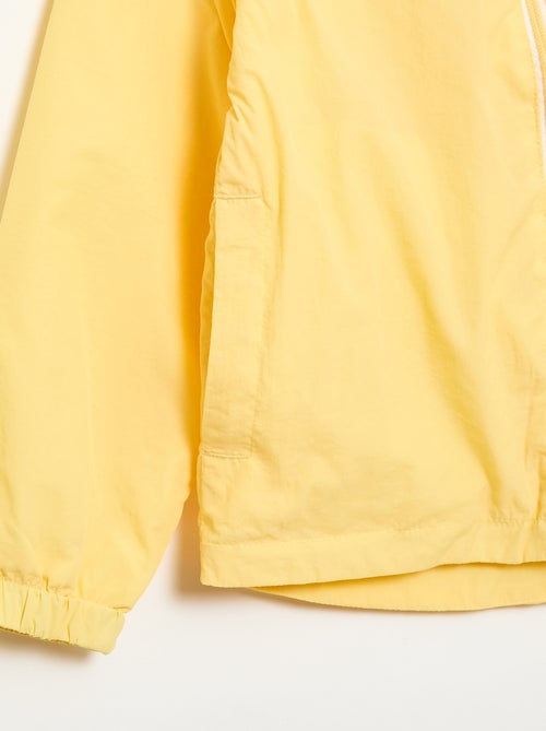 Effen windjas dat in de capuchon kan worden opgeborgen - Kiabi