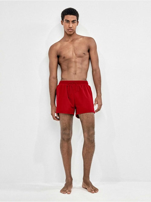 Effen zwembroek voor mannen kleur zwart - Kiabi Effen zwembroek voor mannen kleur zwart - Kiabi