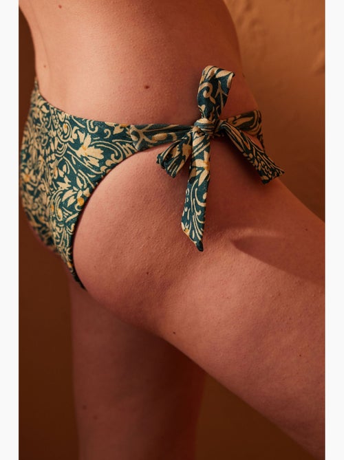 Elegante braziliaanse bikinibroek penti - Kiabi Elegante braziliaanse bikinibroek penti - Kiabi