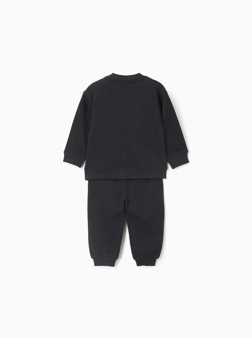 Ensemble de jogging en molleton avec imprimé qui brille dans le noir - Kiabi Ensemble de jogging en molleton avec imprimé qui brille dans le noir - Kiabi