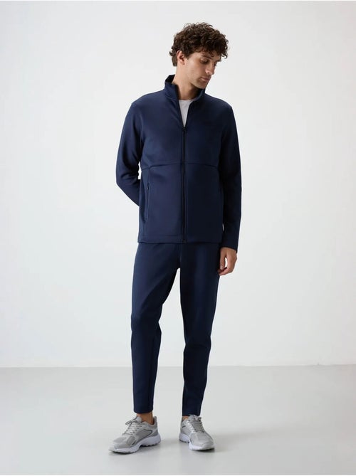 Ensemble de sport homme en scuba, col zippé tommy - Kiabi Ensemble de sport homme en scuba, col zippé tommy - Kiabi