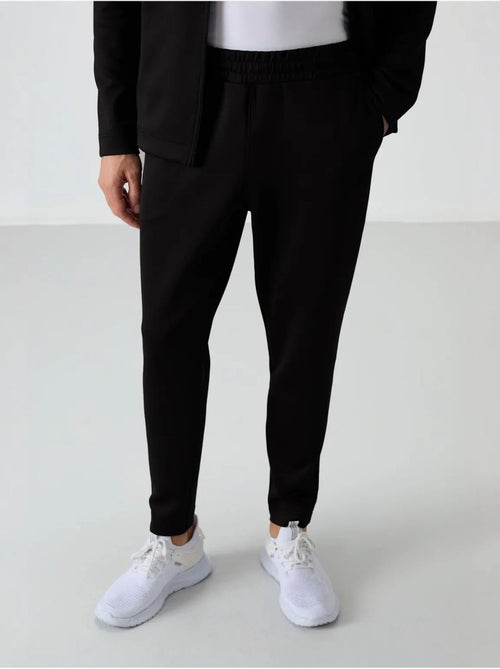 Ensemble de sport homme en scuba, col zippé tommy - Kiabi Ensemble de sport homme en scuba, col zippé tommy - Kiabi