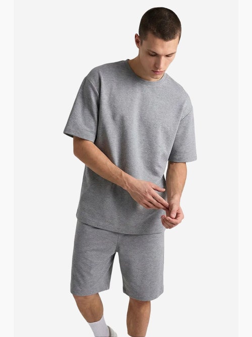 Ensemble de sport homme oversize court tommy - Kiabi Ensemble de sport homme oversize court tommy - Kiabi