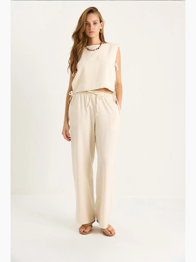 Ensemble deux pièces à col ras du cou et fermeture à nouer avec pantalon large lucci Beige argile - Kiabi