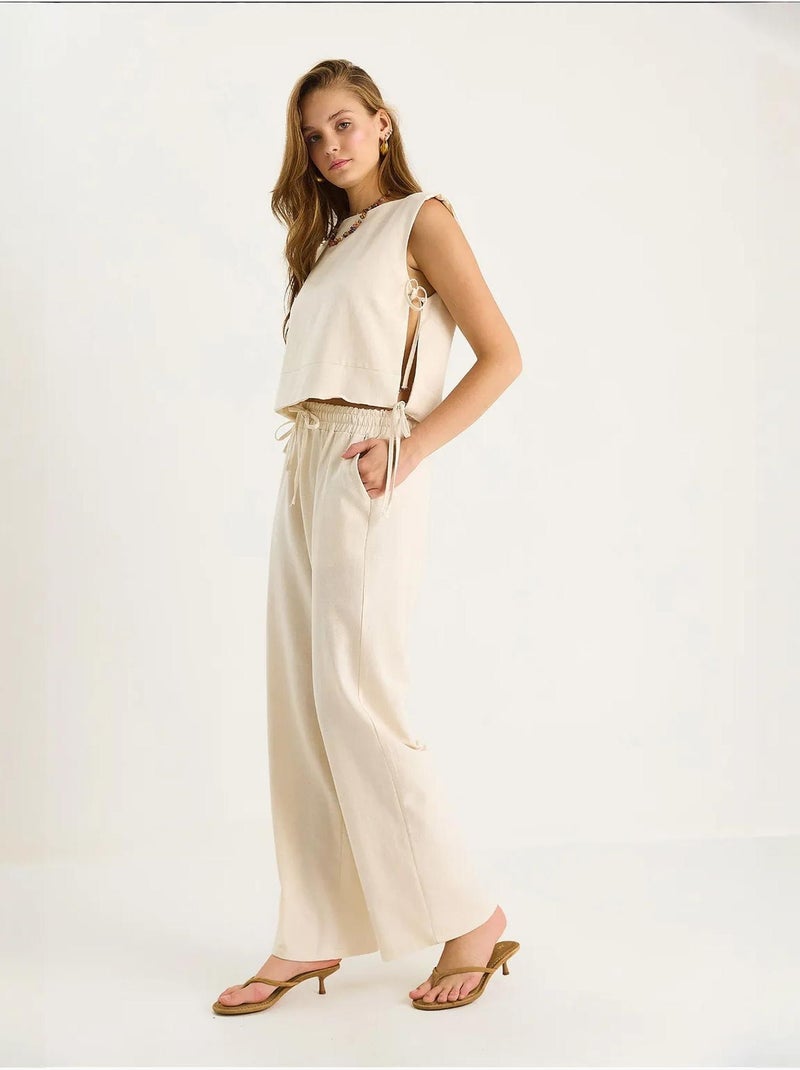 Ensemble deux pièces à col ras du cou et fermeture à nouer avec pantalon large lucci Beige argile - Kiabi
