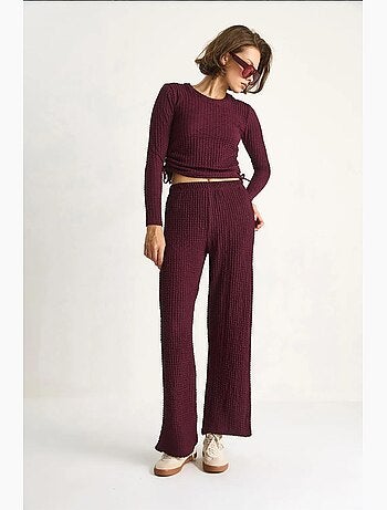 Ensemble deux pièces ajusté avec pantalon évasé lucci