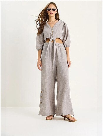Ensemble deux pièces avec chemisier à nouer, ourlet boutonné doublé et pantalon doublé lucci