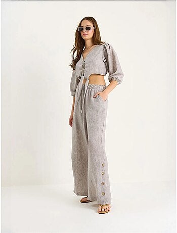 Ensemble deux pièces avec chemisier à nouer, ourlet boutonné doublé et pantalon doublé lucci