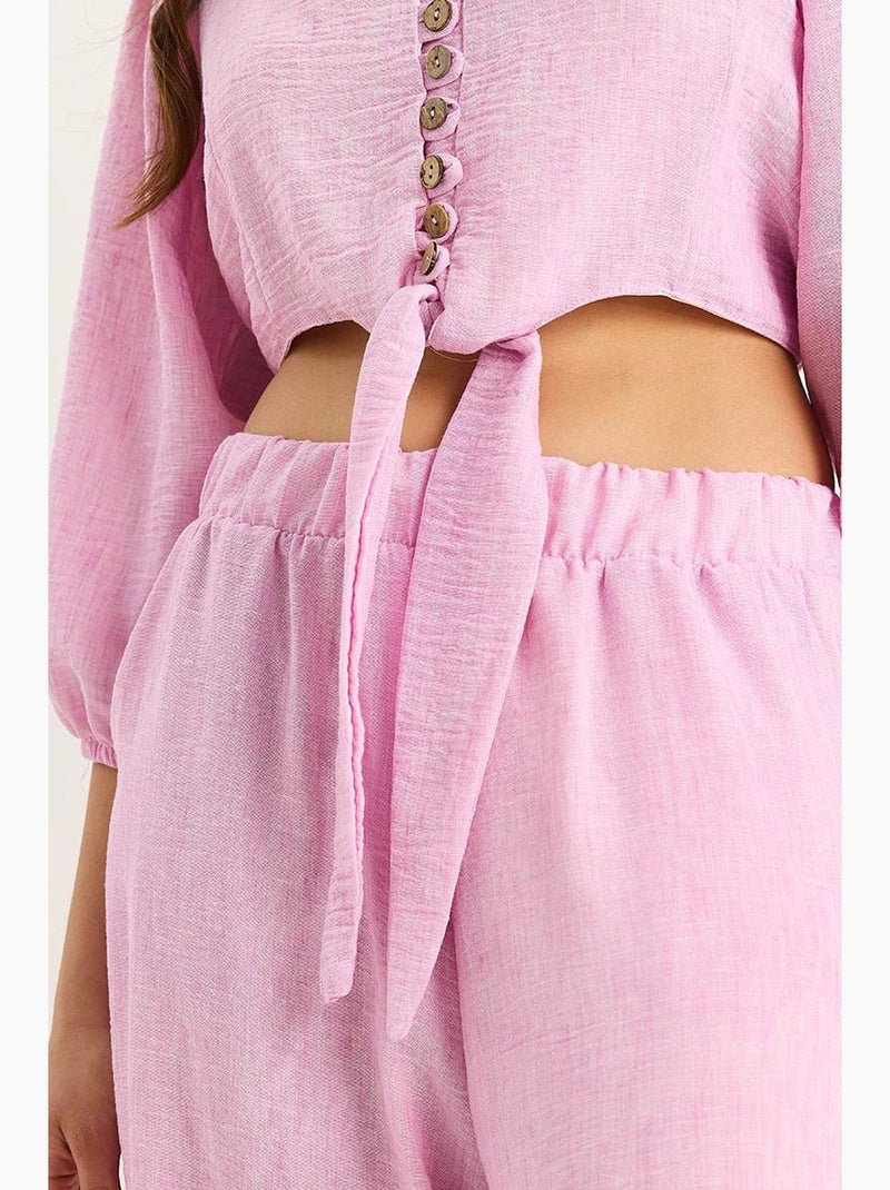 Ensemble deux pièces avec chemisier à nouer, ourlet boutonné doublé et pantalon doublé lucci Rose fluo/Solinotes - Kiabi