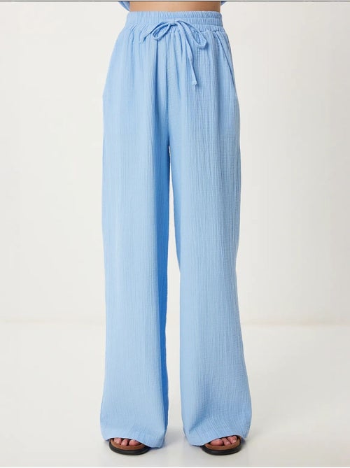 Ensemble deux pièces coordonné à taille haute, jambe large et col chemise istanbul - Kiabi Ensemble deux pièces coordonné à taille haute, jambe large et col chemise istanbul - Kiabi