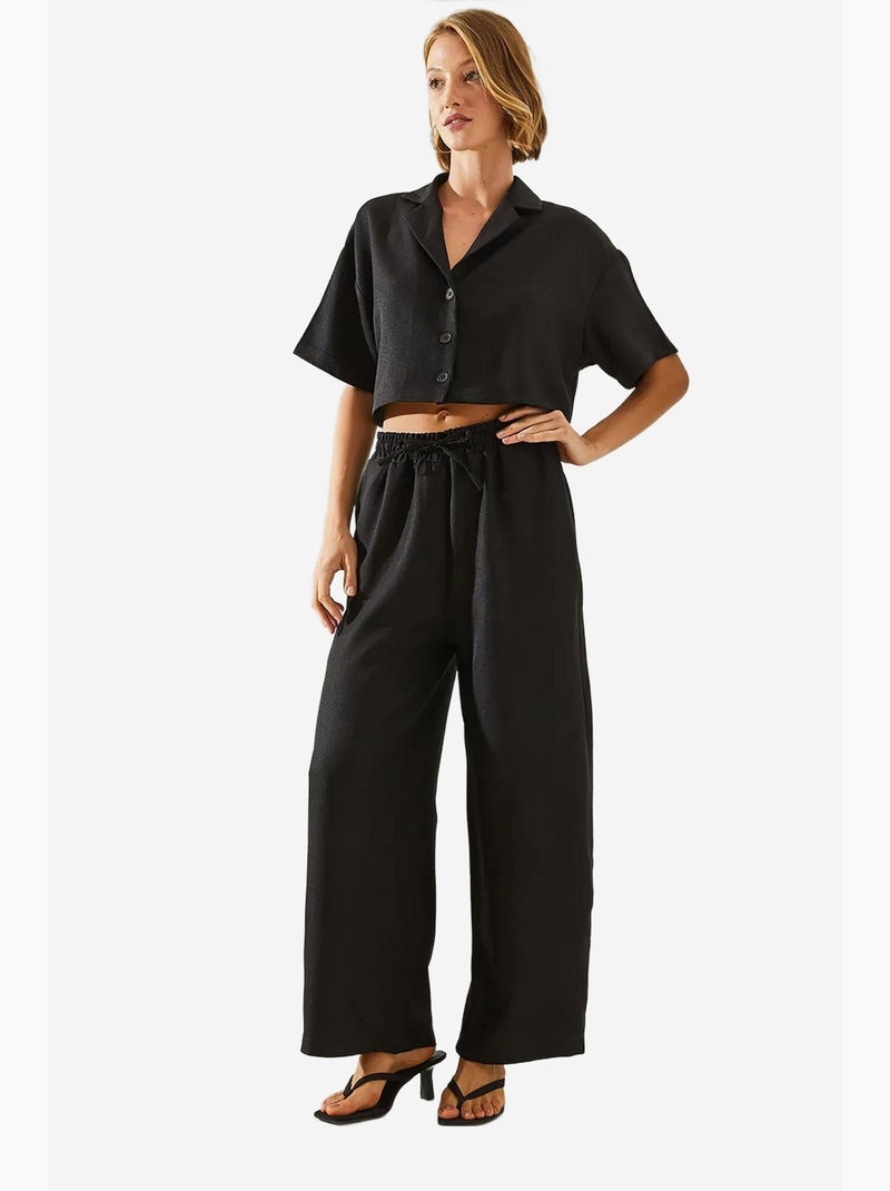 Ensemble deux pièces haut court à col veste et pantalon boutonné à poches lucci Noir - Kiabi
