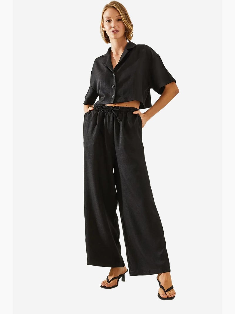 Ensemble deux pièces haut court à col veste et pantalon boutonné à poches lucci Noir - Kiabi