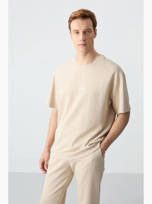 Ensemble homme t-shirt et pantalon oversize tommy - Kiabi Ensemble homme t-shirt et pantalon oversize tommy - Kiabi
