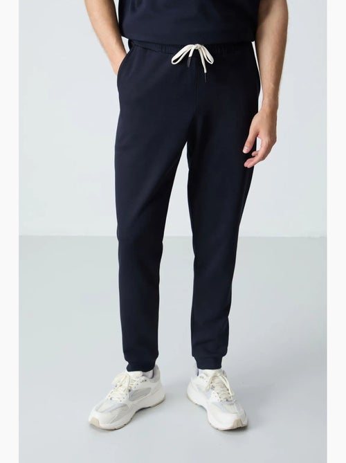 Ensemble homme t-shirt et pantalon oversize tommy - Kiabi Ensemble homme t-shirt et pantalon oversize tommy - Kiabi