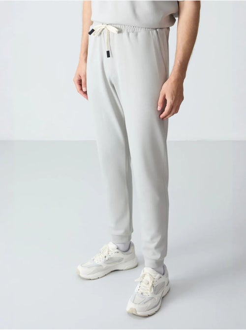 Ensemble homme t-shirt et pantalon oversize tommy - Kiabi Ensemble homme t-shirt et pantalon oversize tommy - Kiabi