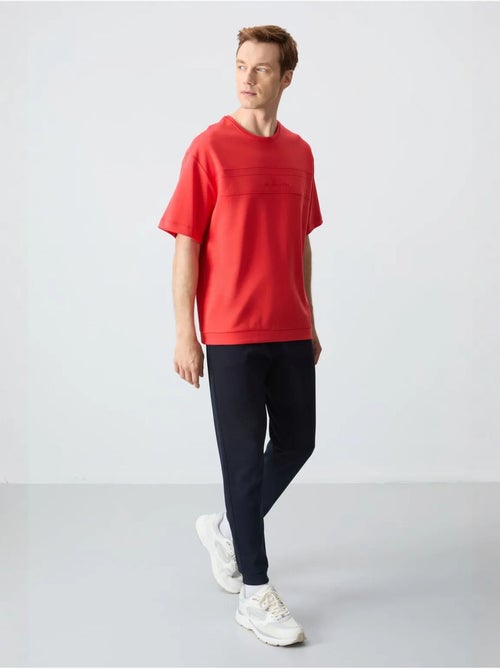 Ensemble homme t-shirt et pantalon oversize tommy - Kiabi Ensemble homme t-shirt et pantalon oversize tommy - Kiabi