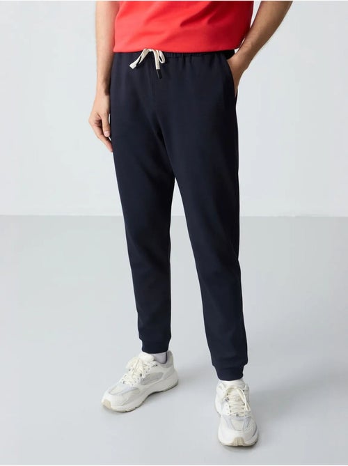 Ensemble homme t-shirt et pantalon oversize tommy - Kiabi Ensemble homme t-shirt et pantalon oversize tommy - Kiabi