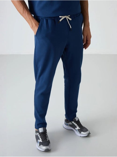 Ensemble homme t-shirt oversize et pantalon tommy - Kiabi Ensemble homme t-shirt oversize et pantalon tommy - Kiabi