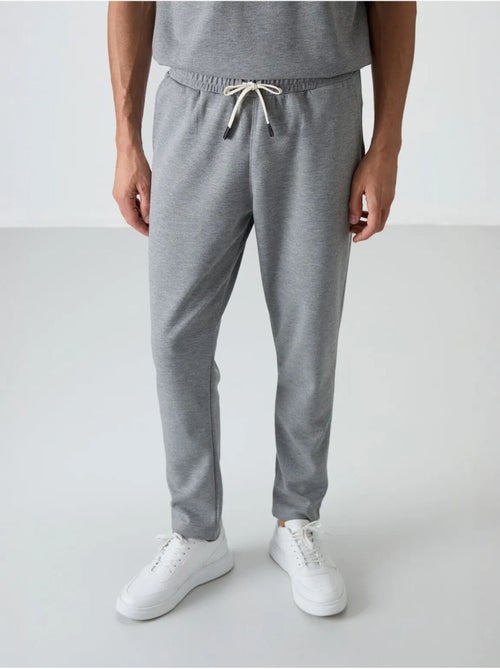 Ensemble homme t-shirt oversize et pantalon tommy - Kiabi Ensemble homme t-shirt oversize et pantalon tommy - Kiabi