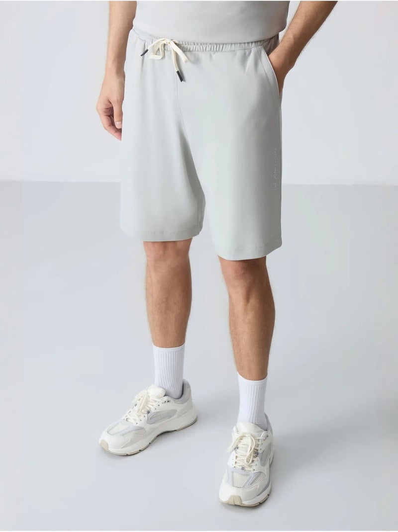 Ensemble homme t-shirt oversize et short en coton mélangé tommy Gris clair - Kiabi
