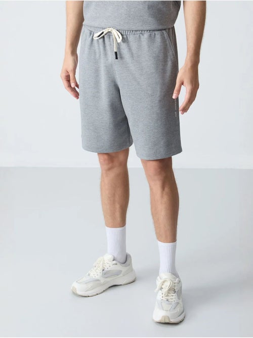 Ensemble homme t-shirt oversize et short en coton mélangé tommy - Kiabi Ensemble homme t-shirt oversize et short en coton mélangé tommy - Kiabi