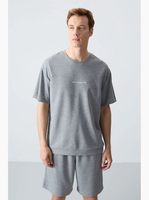 Ensemble homme t-shirt oversize et short en coton mélangé tommy - Kiabi Ensemble homme t-shirt oversize et short en coton mélangé tommy - Kiabi
