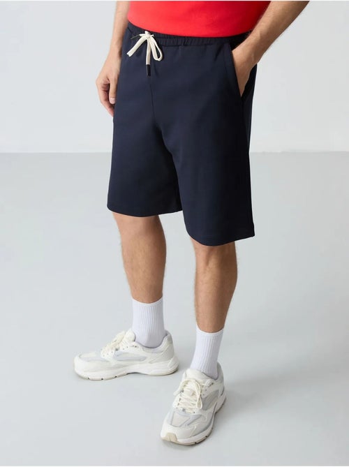 Ensemble homme t-shirt oversize et short en coton mélangé tommy - Kiabi Ensemble homme t-shirt oversize et short en coton mélangé tommy - Kiabi