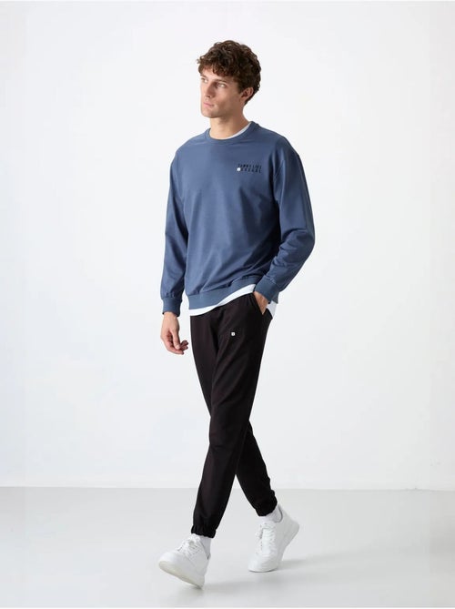 Ensemble sweat et pantalon oversize col rond tommy - Kiabi Ensemble sweat et pantalon oversize col rond tommy - Kiabi