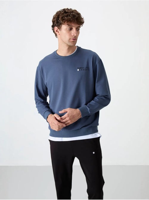 Ensemble sweat et pantalon oversize col rond tommy - Kiabi Ensemble sweat et pantalon oversize col rond tommy - Kiabi