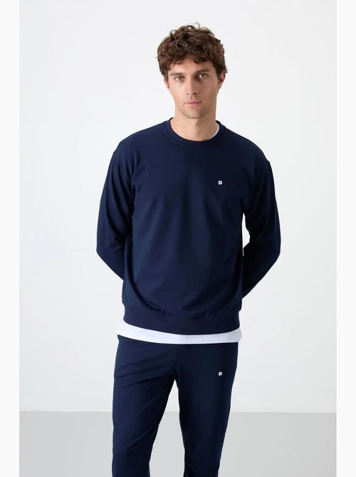 Ensemble sweat et pantalon oversize col rond tommy - Kiabi Ensemble sweat et pantalon oversize col rond tommy - Kiabi